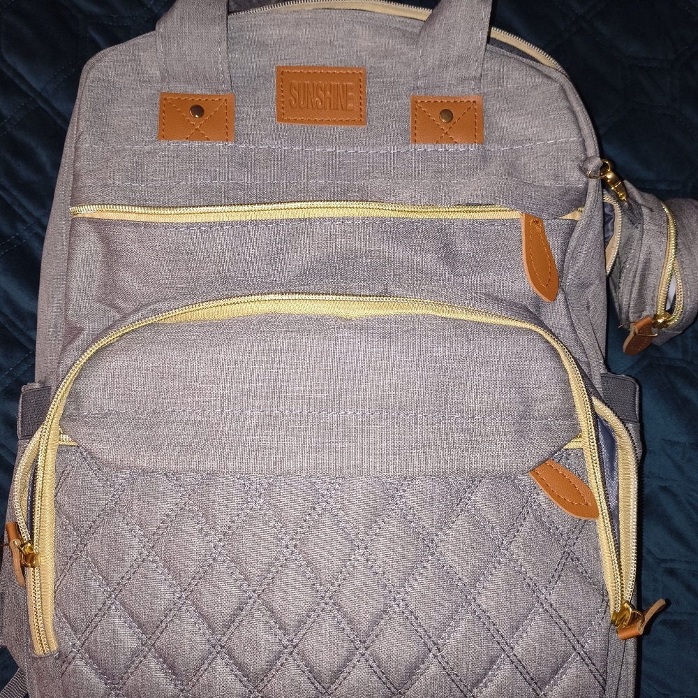 Gray Quilted Backpack with Tan Accents
